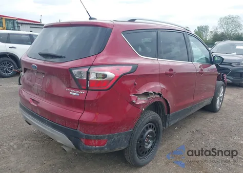 2017 Ford Escape Titanium z USA, uszkodzony, nr VIN 1FMCU9J95HUE90048